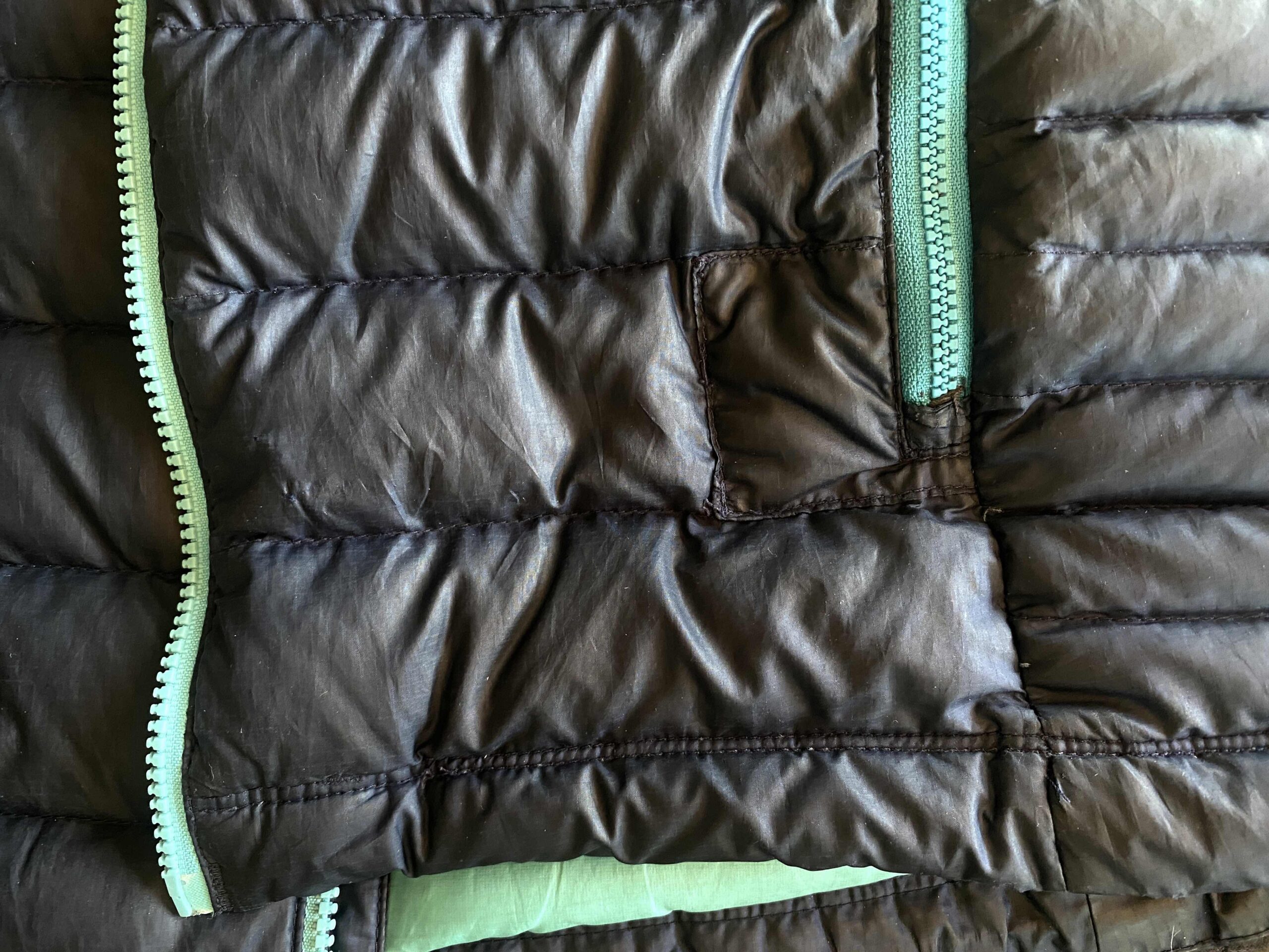Visible repair of a Patagonia down jacket